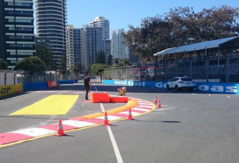 The two-stage orange tyre bundle at the exit of the beachside chicane. pic: shane van gisbergen via twitter