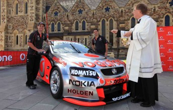 Jesus for Bathurst? Craig Lowndes and Jamie Whincup with Father Dean Marin at St Francis Xavier