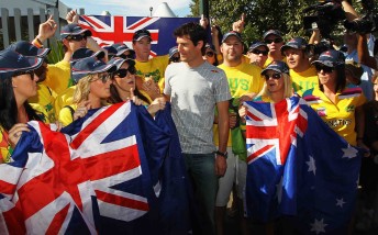 Australian Mark Webber meets The Fanatics before practice for the Australian Formula One Grand Prix at the Albert Park Circuit