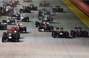 Webber (centre) struggles off the line at Singapore