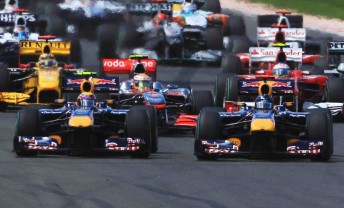 Mark Webber and Sebastian Vettel fight over the first turn at the British Grand Prix earlier this year. On this occasion, Webber won the fight ...