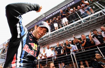 Mark Webber celebrates after winning the British Grand Prix – one of four wins this year