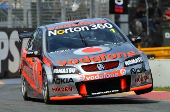 thumb Whincup leaps over the turn one kerb on his way to a penalty – then the fastest lap!