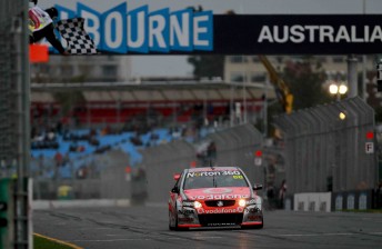 Jamie Whincup crosses the line for a crushing Race 1 win