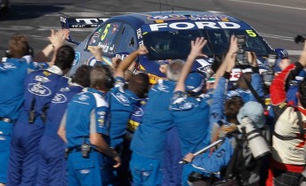 The FPR crew celebrate as Mark Winterbottom races to victory at the Sucrogen Townsville 400