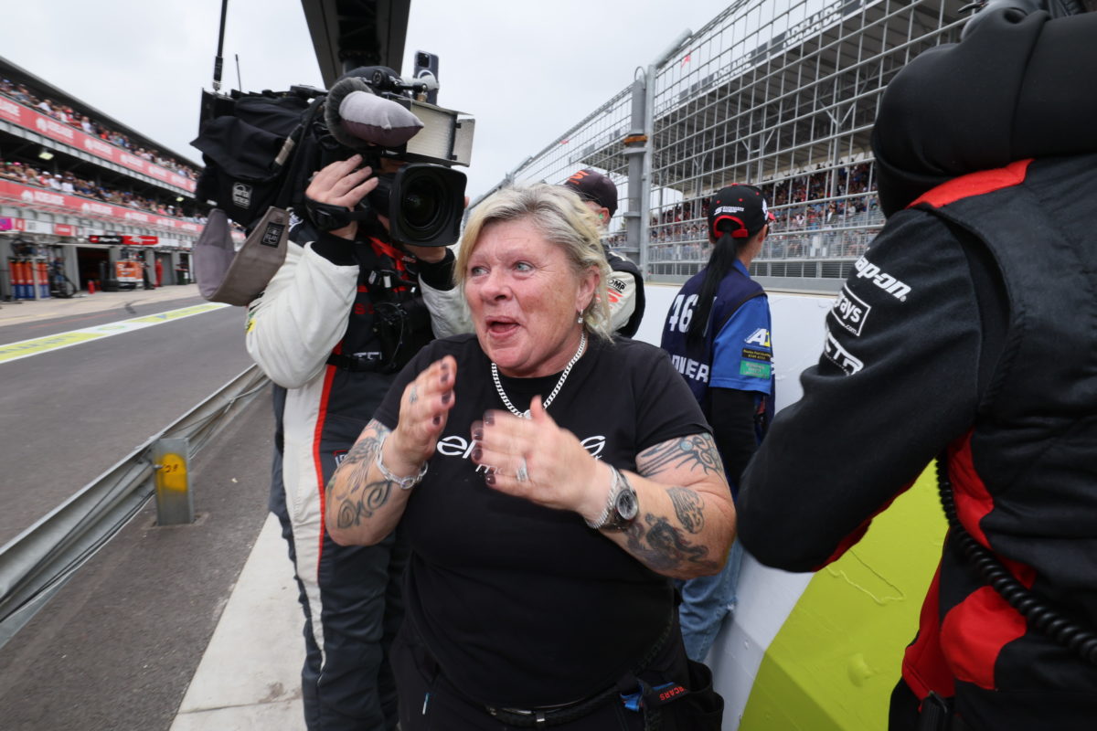 Betty Klimenko after Brodie Kostecki crossed the line in Race 27 to seal Erebus Motorsport's first drivers' championship title. Image: Supplied