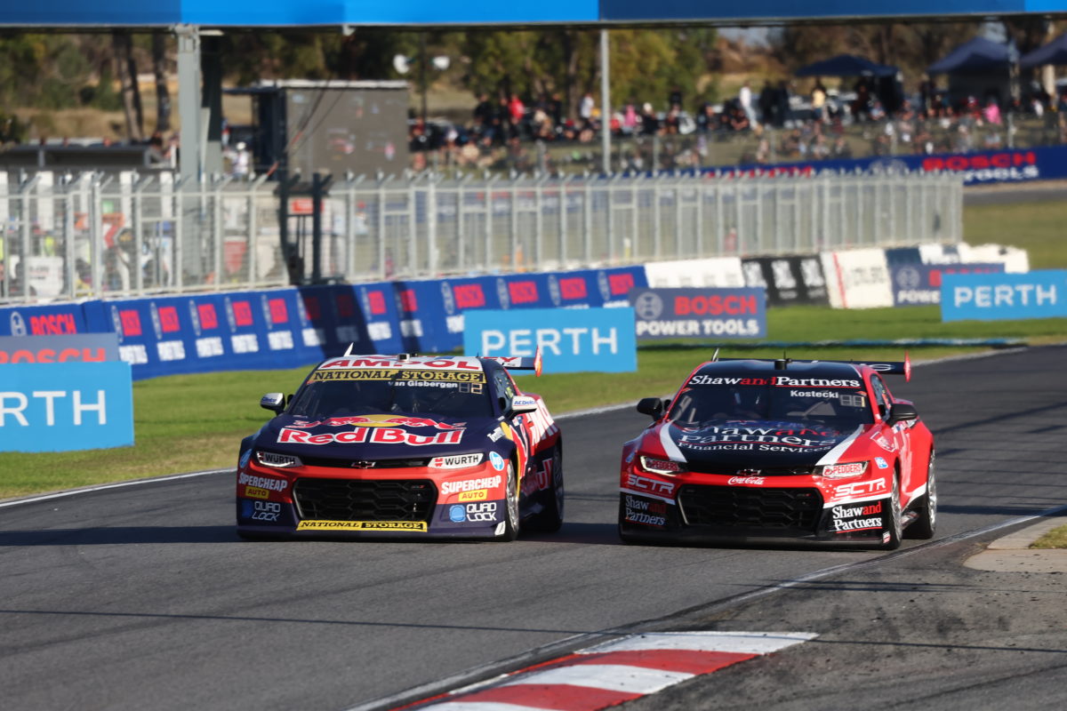 Shane van Gisbergen battles with Brodie Kostecki for the lead in a Supercars Championship race at Wanneroo Raceway in Perth in April 2023