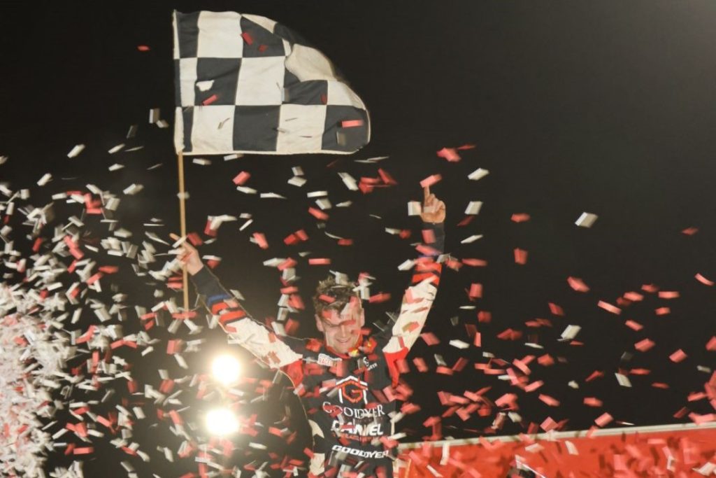 Jock Goodyer stands atop his car after winning at Toowoomba Speedway. Image: Matthew Paul Photography