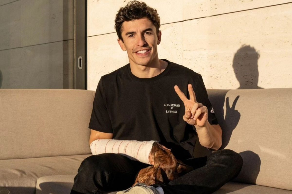 Marc Marquez at home wearing a bandage on his right arm after arm pump surgery
