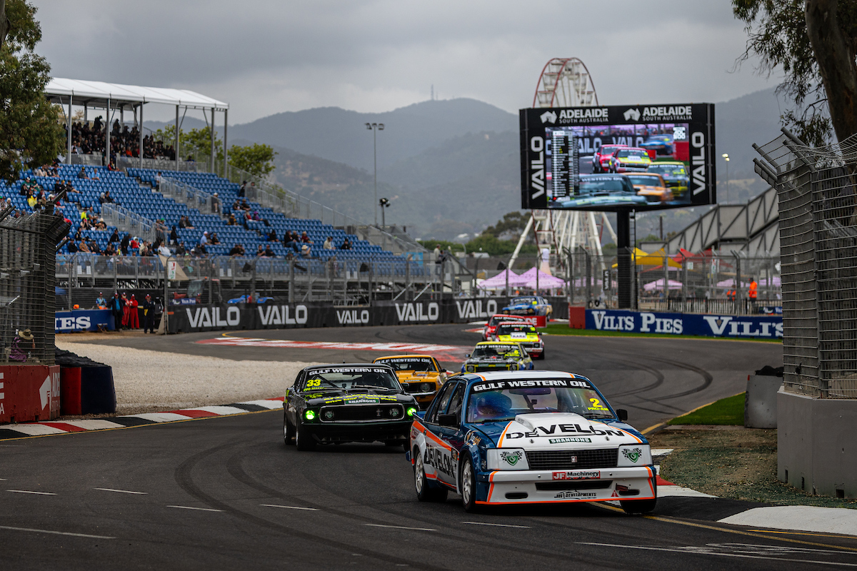 The Touring Car Masters field races through Senna Chicane at the 2023 Adelaide 500