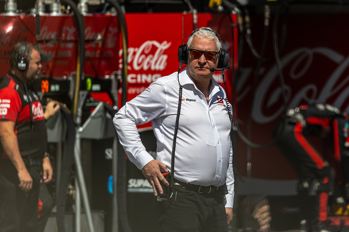 Supercars Head of Motorsport Adrian Burgess stands in pit lane at the 2023 Gold Coast 500